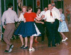 [Color photograph of square dancers]